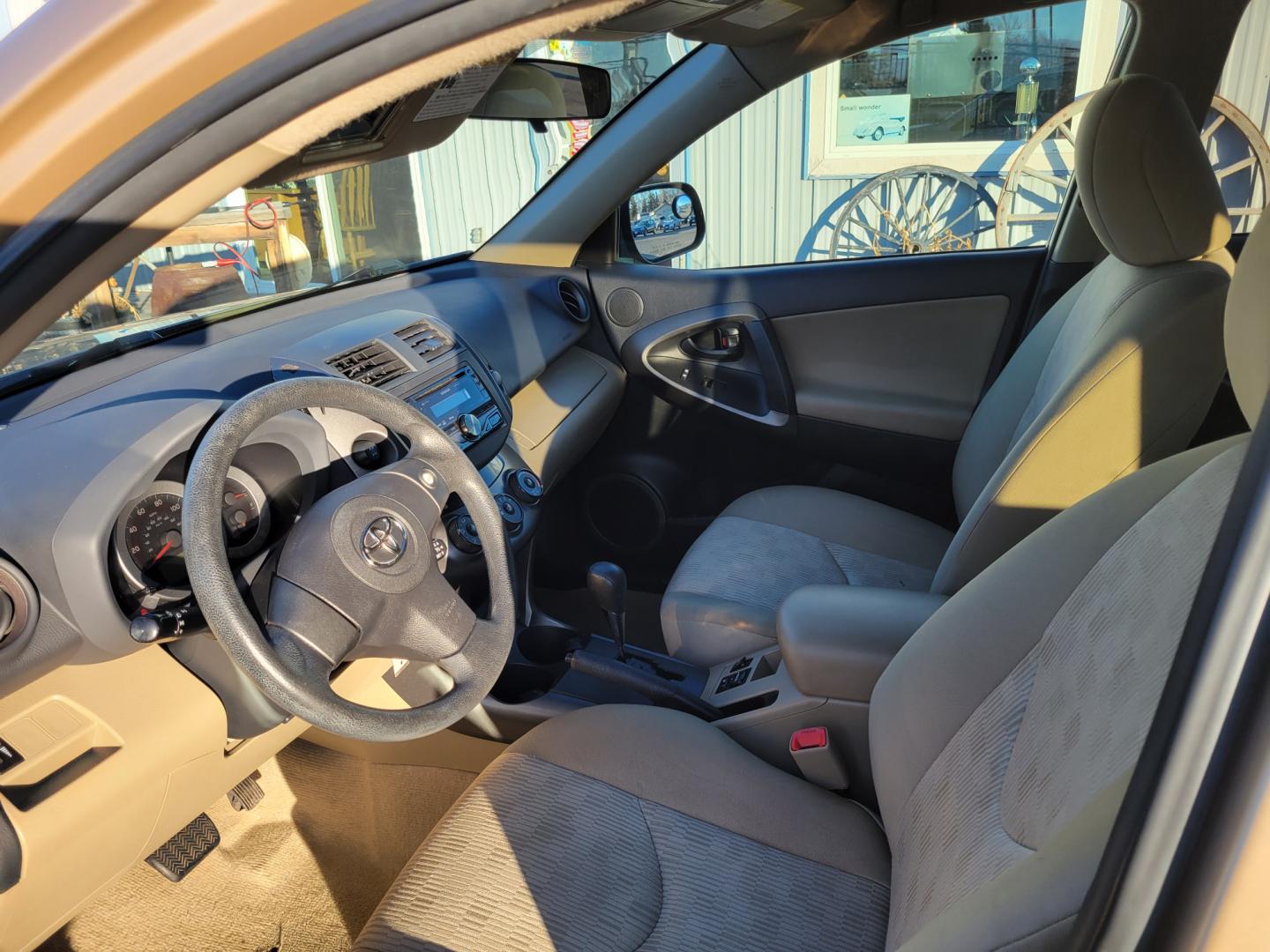 2010 Gold /Tan Toyota RAV4 I4 (2T3BF4DV7AW) with an 2.5L engine, Automatic transmission, located at 450 N Russell, Missoula, MT, 59801, (406) 543-6600, 46.874496, -114.017433 - Great Running AWD SUV. Air. Cruise. Tilt. Power Windows and Locks. Very Clean. - Photo#16